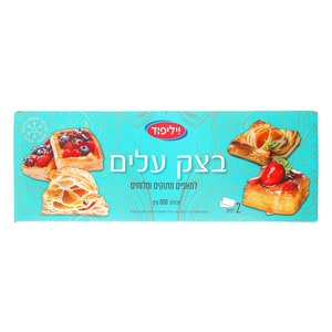 קופסה של בצק עלים עם תמונות של מאפים ממולאים, עם כיתוב "בצק עלים" בעברית.